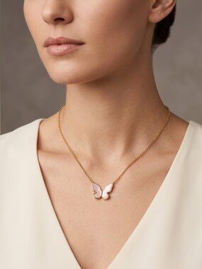 7. Kate Spade Delicate Gold Butterfly Necklace